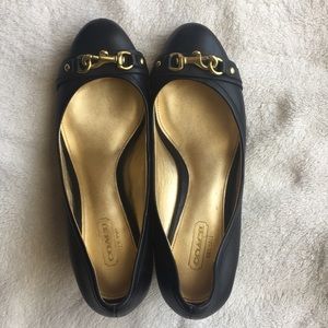 Coach black leather wedge size 7 medium.
